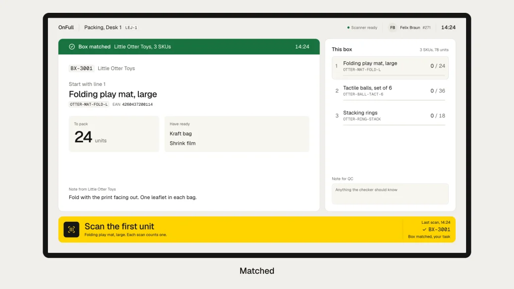 The packer's station: the scanned box matches the task, a green band.